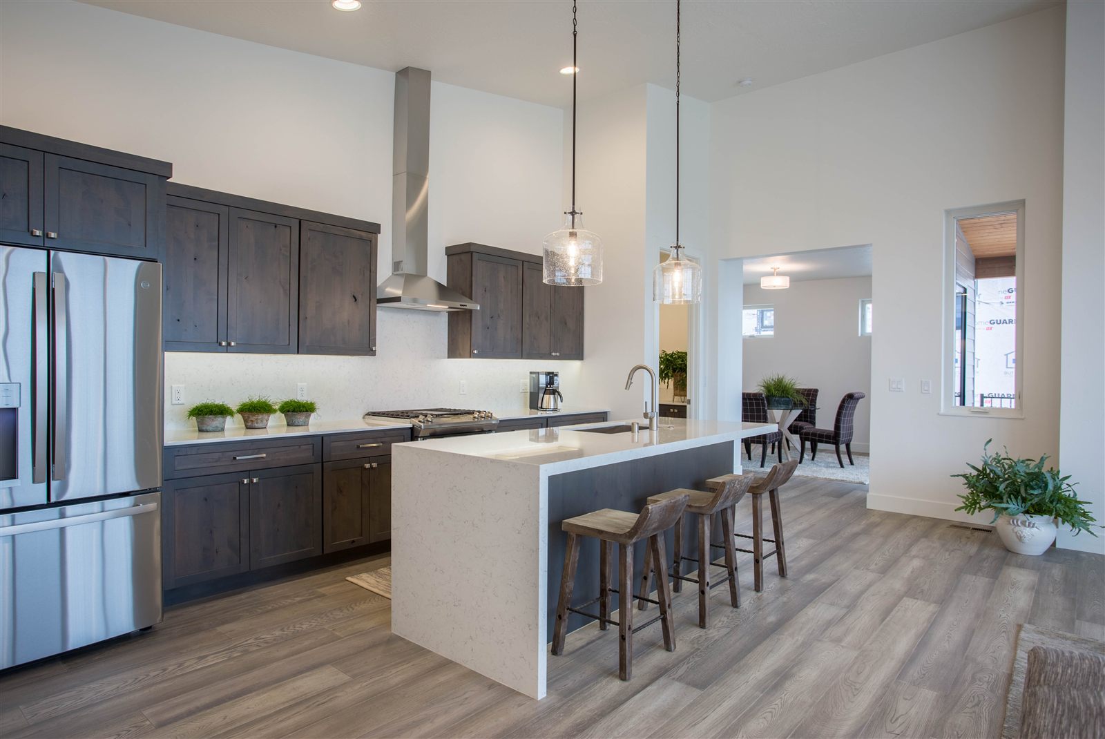 Modern kitchen with waterfall island photographed for a Missoula listing