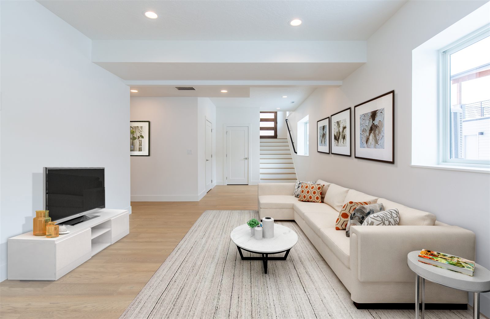Downstairs living room in a Missoula home virtually staged by PMZ Photography